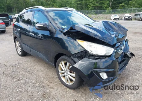 2010 Hyundai Tucson Limited z USA, uszkodzony, nr VIN KM8JUCAC0AU047182